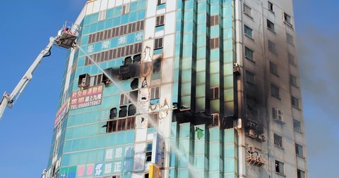 Tainan, Taiwan - July 18, 2018: fire disaster and strong smoke covered building