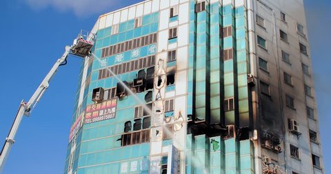 Tainan, Taiwan - July 18, 2018: fire disaster and strong smoke covered building