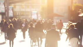 crowd of people walking on the street in abstract big city, back light, Europe - Powered by Shutterstock - Get 15% off with code: PIKWIZARD15
