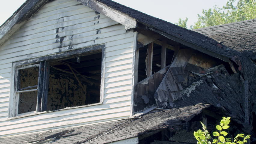 Caved In Roof And Burnt Out Windows House Fire