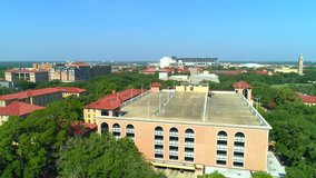 Aerial drone footage of a college campus or hospital compound