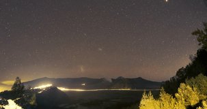 Mount Bromo misty night star trail time-lapse video clip, Indonesia
