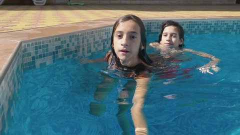 Two Happy Teenagers Brother Sister Swimming Stock Footage Video (100% ...