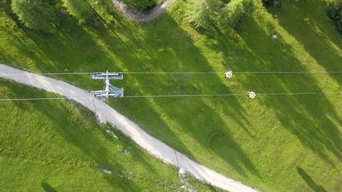 Vertical view of a cable lift at Dolomites in Italy