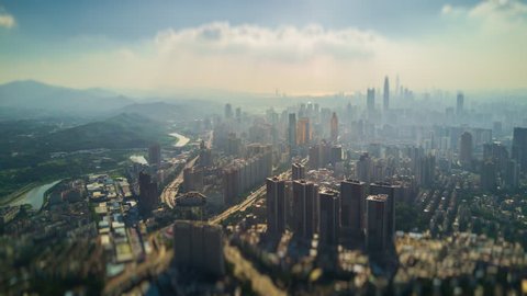 sunny day shenzhen cityscape hongkong border riverside aerial panorama 4k tilt shift timelapse china
