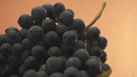 Grapes on a wooden table, rotation 360 degree background.