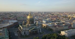 4K aerial drone video of beautiful vintage architecture of St.-Petersburg city center, majestic Saint Isaac's Cathedral - Isaakievskiy Sobor at Neva River embankment of the Russia's northern capital