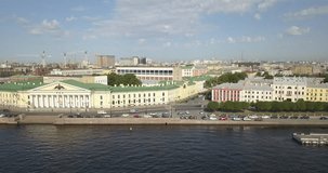4K aerial sunny day video view of Saint Petersburg's shipyard production area, Neva River panorama, historical icebreaker moored near Finnish Bay and surroundings of Russia's northern capital
