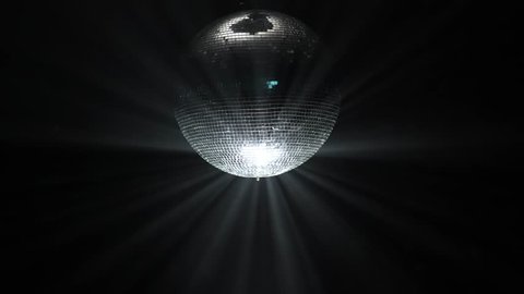 Party lights disco ball on black background