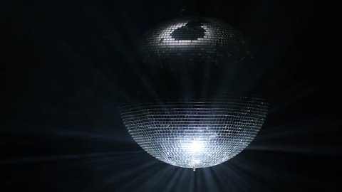 Spinning disco ball on a black background