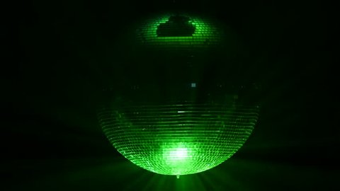 3D Disco mirror ball reflecting colorful lights smoke on black background