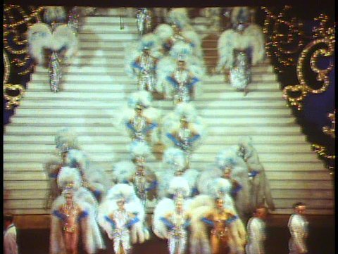 PARIS, FRANCE, 1988, The Folies Bergere show wide shot, blue and white boas