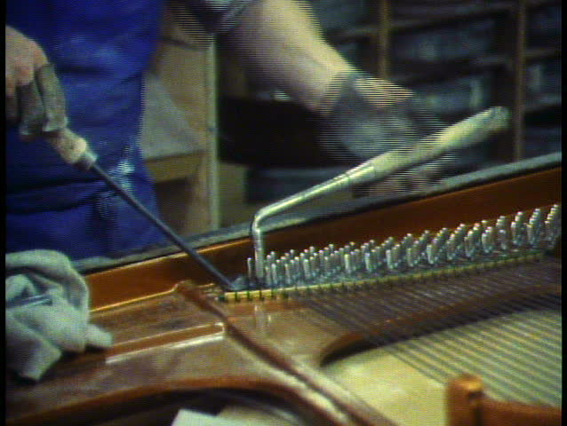VIENNA, AUSTRIA, 1988, Bosendorfer Piano Company, close up turning wrench
