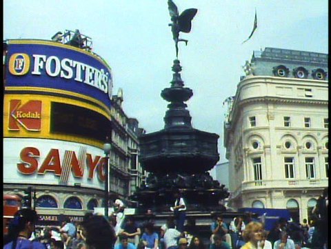 LONDON, ENGLAND, 1988, Piccadilly Circus, wide shot, Eros Statue, traffic people
