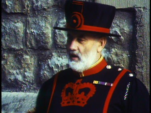 LONDON, ENGLAND, 1988, Beefeater, Yeoman Warder, talking, close up