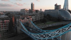 Drone video of the south side of tower bridge with the city hall and potters fields park in background.