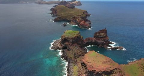 Spectacular aerial views over volcanic islands, coves, Atlantic Ocean cliffs at the eastern end of Madeira island