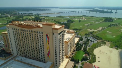 LAKE CHARLES, LOUISIANA, USA - AUGUST 1, 2018: Aerial reveal Golden Nugget Casino Lake Charles Louisiana USA