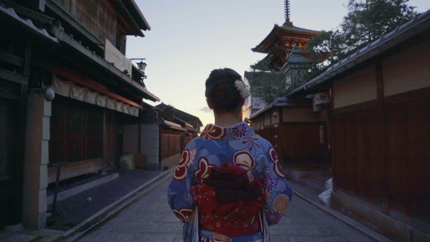 Asian woman wearing japanese traditional kimono at Yasaka Pagoda and Sannen Zaka Street in Kyoto, Japan. Royalty-Free Stock Footage #1015267513