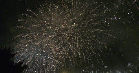 4K high quality video footage of beautiful night sky fireworks explosions night summer show on annual pyrotechnical international festival in celebrations near Moscow River in Moscow, Russia