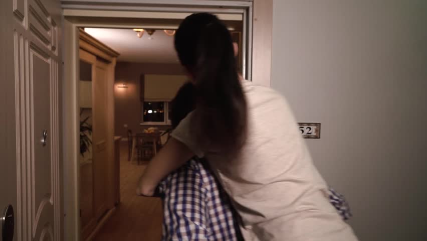 Woman is sitting on man
