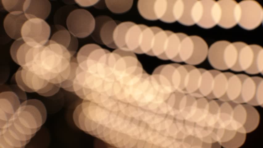 Defocused Lights of Cityscape Bokeh. Abstract defocused city street scene at night | Shutterstock HD Video #1015298998