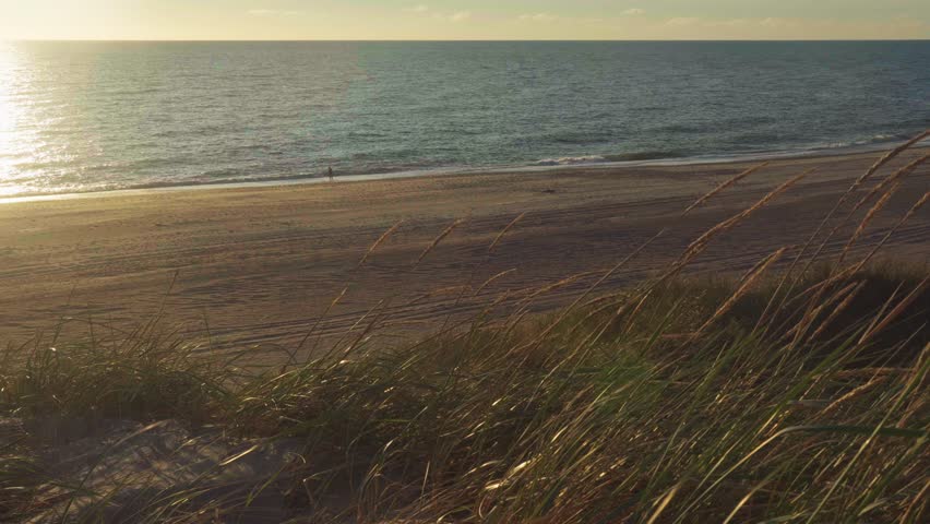 Sunset on the Northsea beach in Denmark. 