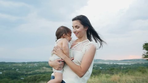 Mom Walks Her Son Standing On Stock Footage Video (100% Royalty-free