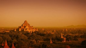 Video 3840x2160 - Landscape in Bagan. Myanmar. with the spires of ancient. Buddhist temple structures at sunset