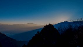 Timelapse landscape sunrise over mountain with flare in the morning at Zhushan station, Alishan National Park, Taiwan. (4K Video)