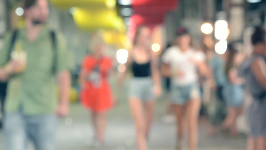Blurred background interior shopping center mall. Blurry backdrop corridor people bokhe. Space shopping center with people who stand by windows, purchasing, walking. Buyer customer purchaser shopper