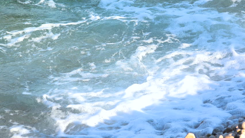 4K Beautiful pebble beach with large waves and foam. | Shutterstock HD Video #1015332652
