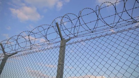 Barbed Wire On Net Fence Stock Footage Video 100 Royalty Free Shutterstock Barbed Wire On Net Fence Stock Footage Video 100 Royalty Free Shutterstock