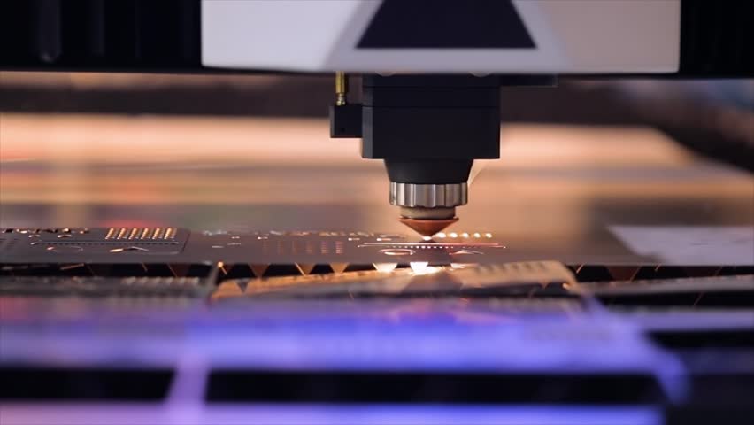 CNC Laser cutting of metal in slow motion, modern industrial technology. Royalty-Free Stock Footage #1015336603