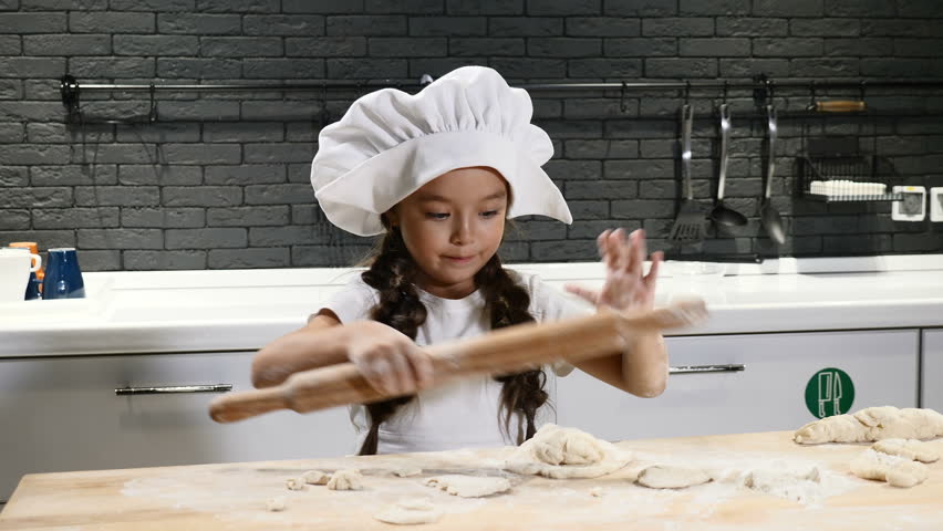 Little girl Chef In The Kitcheen...