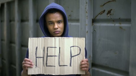 Help sign in begging afro-american boys hands, stop war, refugee problem