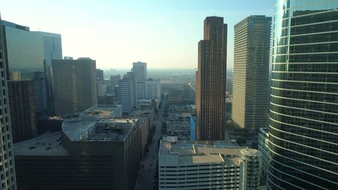HOUSTON, TEXAS, USA - AUGUST 1, 2018: Aerial hyperlapse Downtown Houston Texas and the Toyota Center