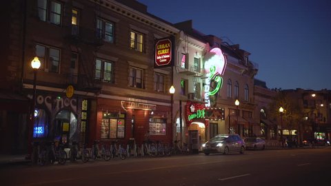 San Francisco, United States - September, 2017: Shops signs at night in a city