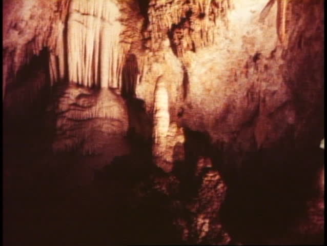 CARLSBAD CAVERNS NATIONAL PARK, NEW MEXICO, 1978, yellow light, stalactites