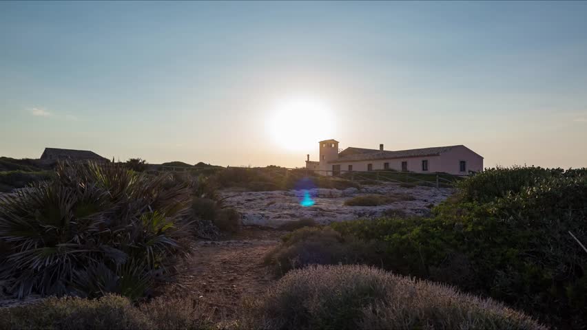 Beautiful sunset time lapse with an observation control tower in the foreground