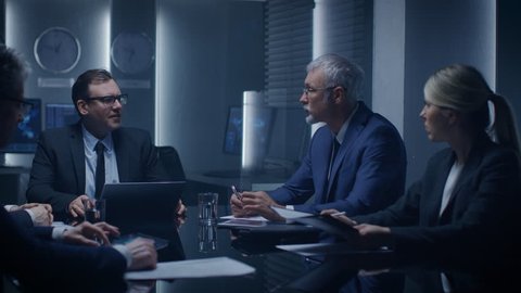 Corporate Executives Have a Closed Meeting With the Goverment Officials. Serious Business People Talking, Negotiating, Planning Strategy and Solving Problems. Shot on RED EPIC-W 8K Helium Camera.