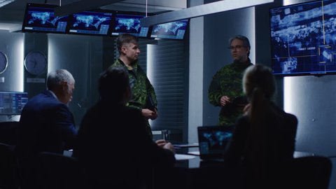 High-Ranking Military Men holds a Briefing to a Team of Government Agents and Politicians, Shows Footage of Satellite Following Target Car Surveillance.  Shot on RED EPIC-W 8K Helium Cinema Camera.