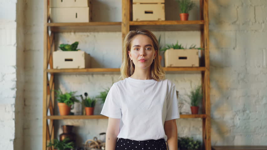 Portrait of angry blonde looking at camera with expressive face, crossing her arms, frowning and shaking head. Negative emotions, hard feelings and women concept.