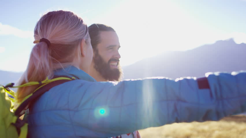 Fit Caucasian male and female team outdoor enjoying adventure expedition in Mount Aspiring Otago New Zealand RED WEAPON
