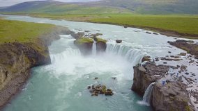 Impressive drone aerial view of waterfalls in Iceland, drone shot from above, high angle view of cascading water into falls, mature no people landscape concept. Travel destinations, 4K