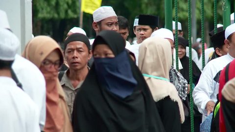 Jakarta, Indonesia - December 1, 2017: People activities at Maulid Nabi celebration in Monas monument area, Jakarta, Indonesia.