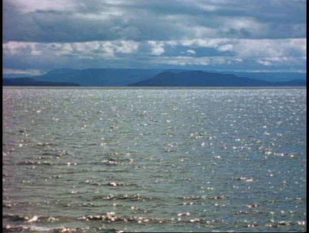 YELLOWSTONE NATIONAL PARK, WYOMING, 1978, Yellowstone lake, backlight, wide shot