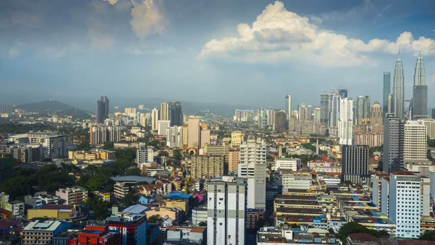 Time-lapse of city scape view under cloudy sky located at Kuala lumpur Malaysia