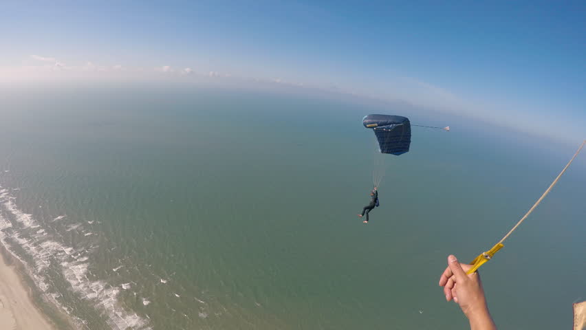 Skydiving over Brazilian beach at sunny day