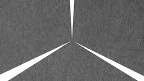 Rotating or spinning shapes with three pieces of gray paper with a rough texture in a CGI high definition motion video clip